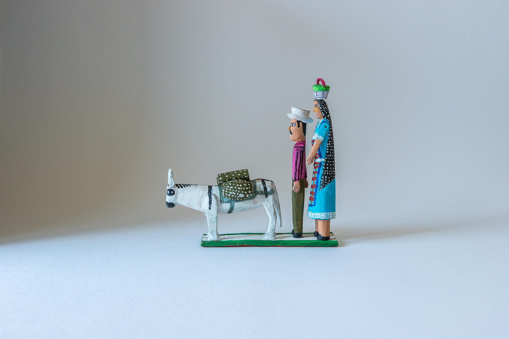 Couple with White Donkey