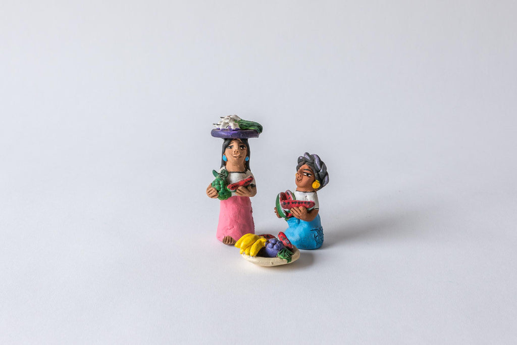 Two Market Women and their Display