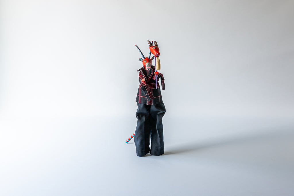 Stilt Dancer with Devil Mask