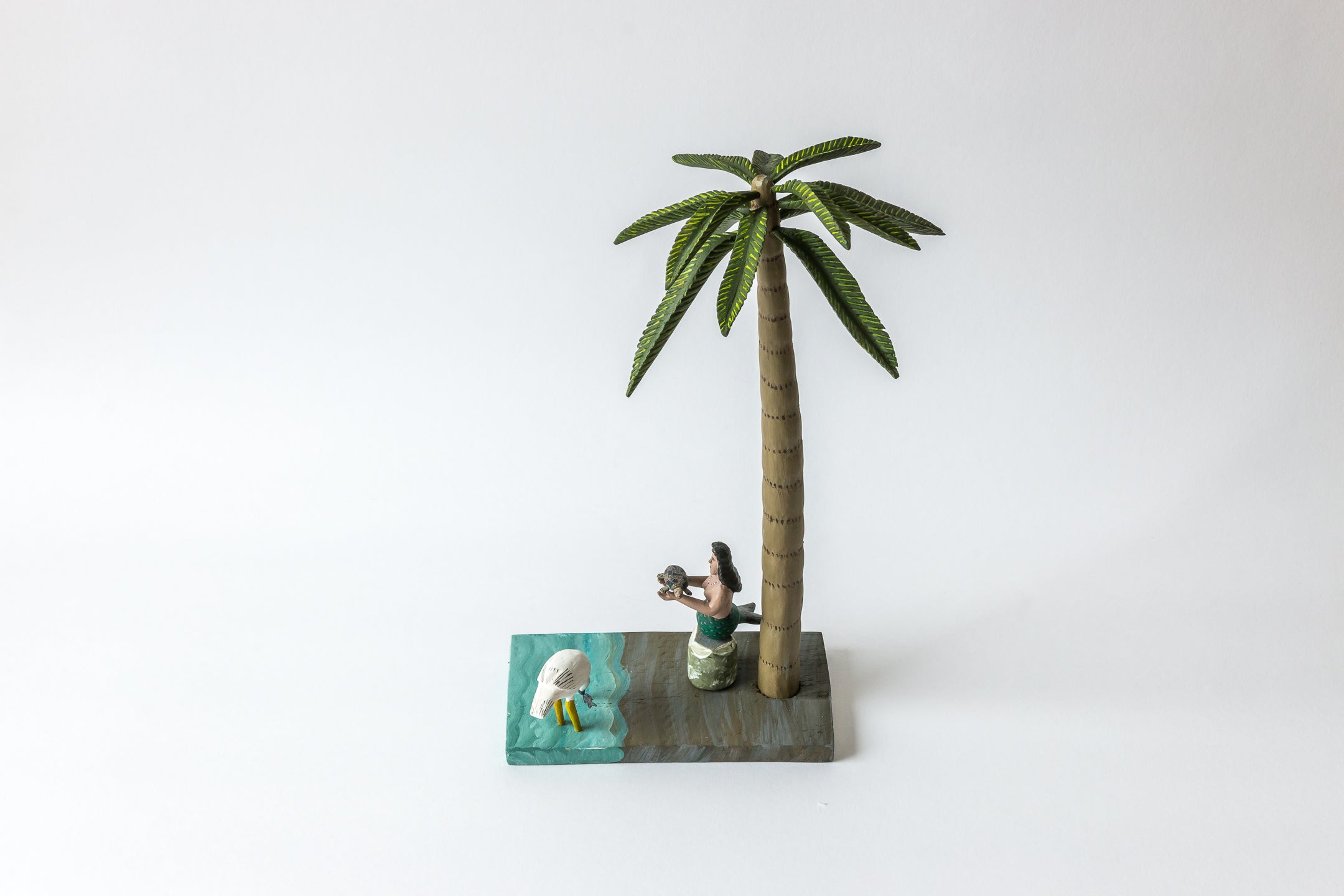 Mermaid under Palmtree