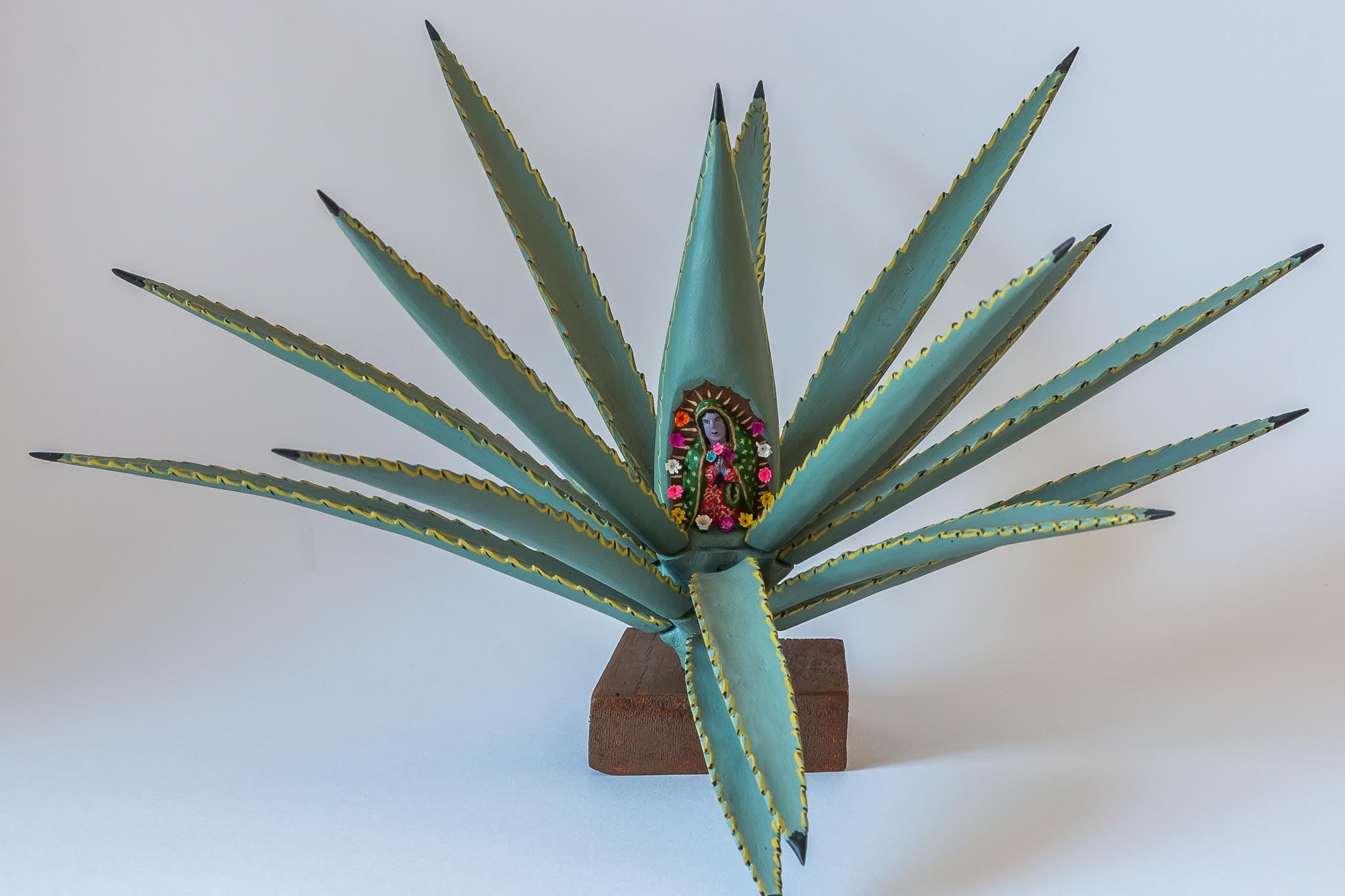 Oaxacan wood carving Gabino Reyes Agave Virgin close up