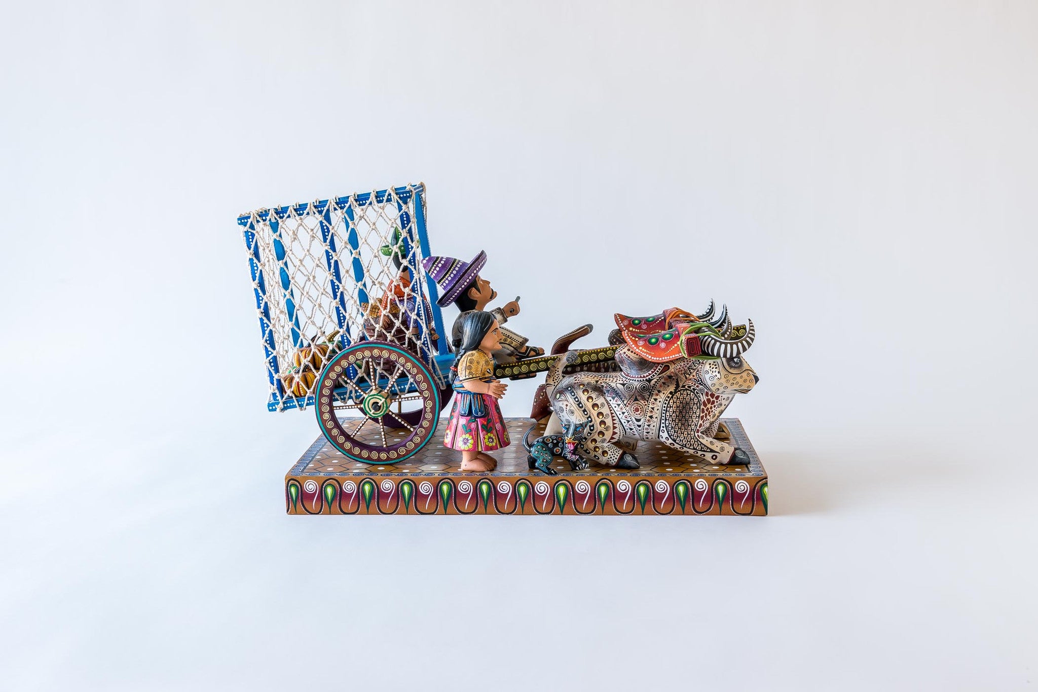 Oaxacan wood carving Manuel Cruz Prudencio Oxcart Side view