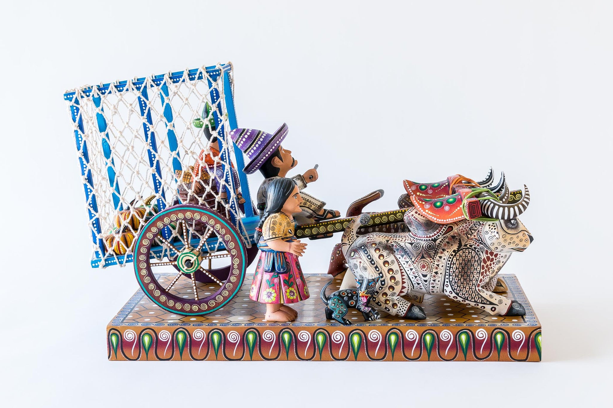 Oaxacan wood carving Manuel Cruz Prudencio Oxcart Close up